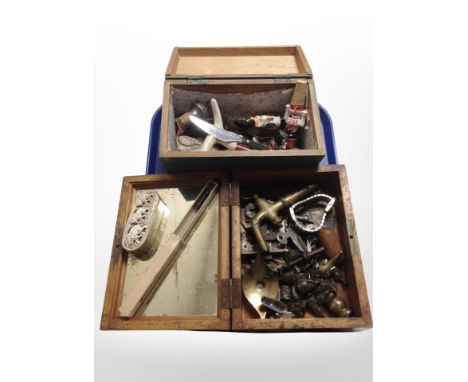 A group of bottle stoppers, brass tap, small cast figures, vintage corkscrew, etc.