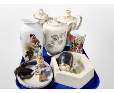 A group of continental porcelain teapots, Hummel figure, Royal Copenhagen lobster dish, etc.