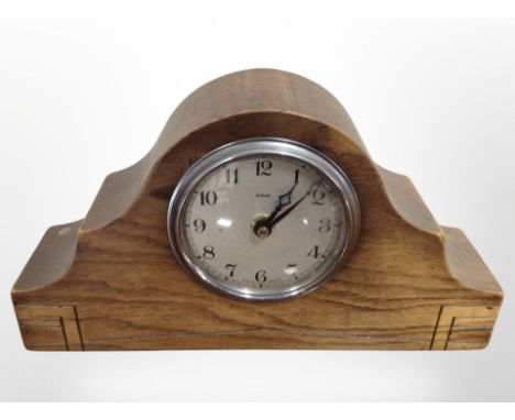 An Enfield oak-cased mantel clock, height 16cm.