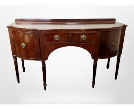 A 19th century mahogany bow-front buffet sideboard in the George III style, 168 cm x 63 cm x 95 cm 