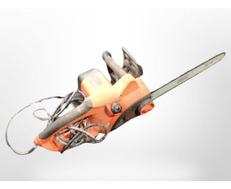 A Black & Decker electric chainsaw.