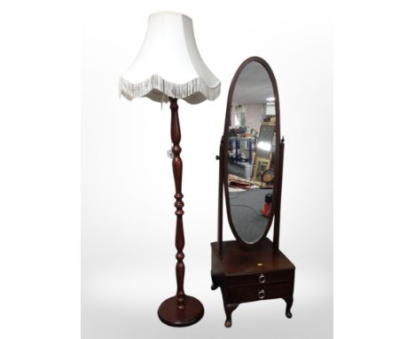 A Stag cheval mirror and reproduction standard lamp 