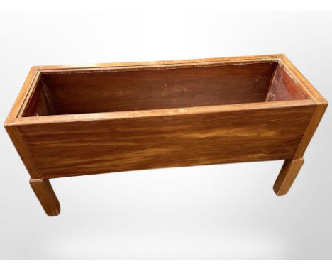 A Danish teak planter, width 78 cm 
