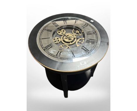 A contemporary clock table, diameter 60 cm 