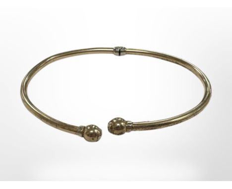 A 9ct gold torque bangle  CONDITION REPORT: 4.4g. 