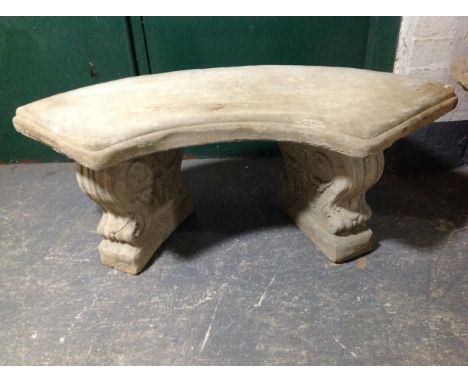 A concrete garden bench on classical-style pedestals, width 102cm.