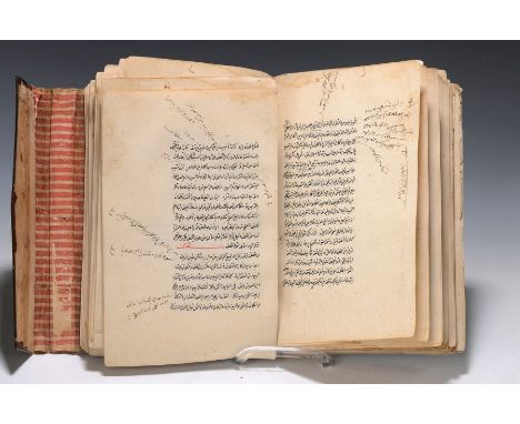 Arabische Handschrift, 19. Jh.,  geprägter Ledereinband, umfangreiche handgeschriebene religiöse Texte, l. Alters- und Gebr.-