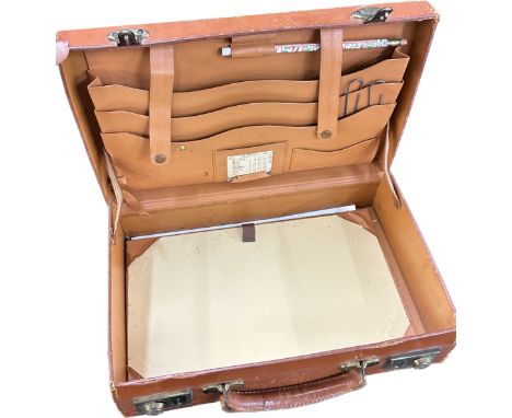 Vintage leather attache case with various compartments 