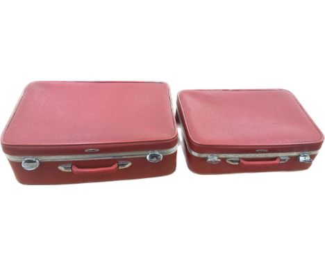 Two vintage red Antler suitcases 