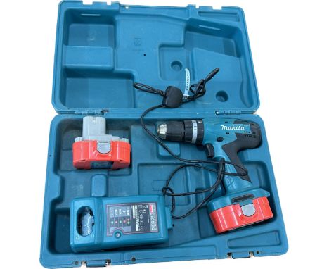 Cased Makita drill set model no DC1804T- untested 