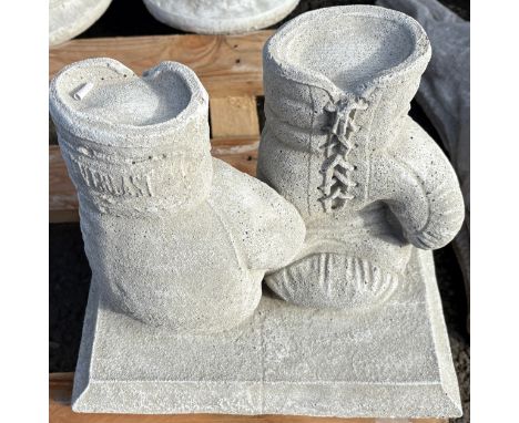 Concrete boxing gloves, approximate height 12 inches