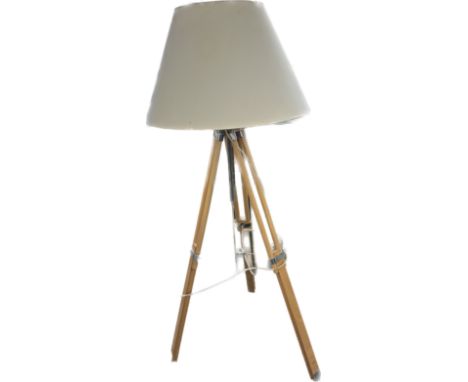 Modern extending floor lamp with beige shade in working order 