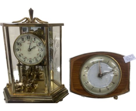 Metamec mantel clock and a Kunder carriage clock overall height of tallest 8.5 inches tall 