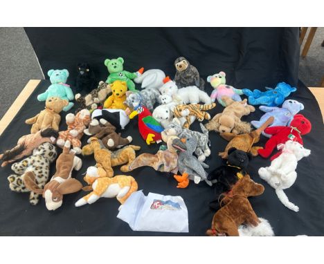 Large selection of assorted vintage TY teddy bears without tags attached 
