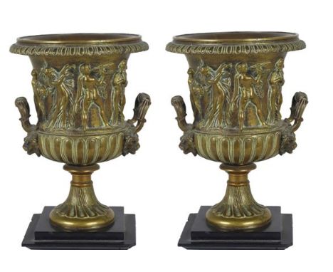 Neo Classical 19th century bronze small urns with two different detailed frieze depictions in high relief, each on metal base