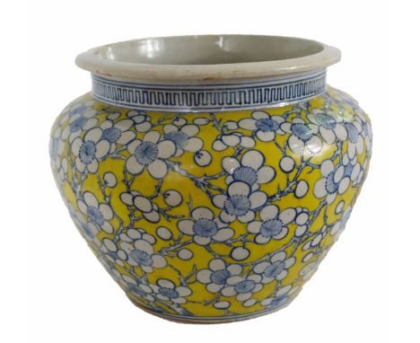 Large Chinese ceramic cache pot with Imperial yellow &amp; blue cherry blossom decoration. Size: 11 diameter x 9 in. high.