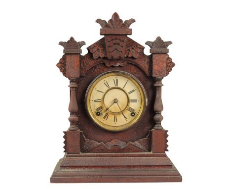 Antique American striking mantel clock, brass gilt dial, black Arabic numerals and hands. Carved oak case, back panel opening