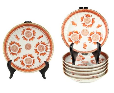 This is a set of 19th. Century Chinese iron red glazed bat plates.  There are sets of five bats surrounding a Shou.The mark i