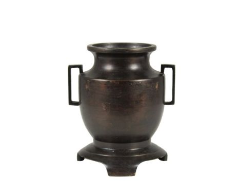 This is a 19th Century Japanese bronze vase with geometric handles on a base. It is marked on the base.  Size: 5 x 4 1/2 in. 