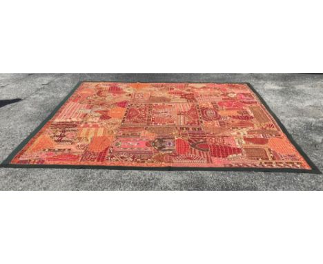 Elaborately embroidered and mirrored Indian tapestry, heavy metal threads, much of it hand stitched. Rich, vivid colors. Top 