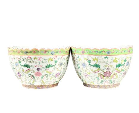 Pair of large Chinese bowls with a mark on the underside of one, and a teal underside on the other. The mark in old seal styl