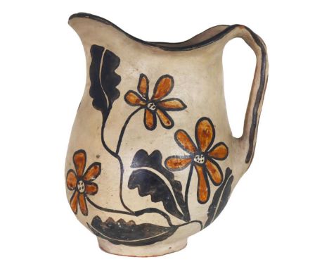 Southwestern Native American pitcher from Kewa Pueblo has red and black flower and leaf decoration on cream colored backgroun