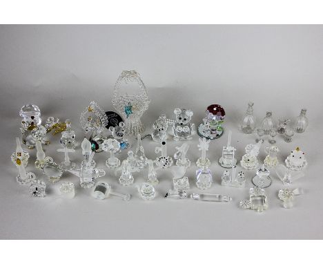 A collection of thirty ornaments from the Crystal Miniature Collection (some with leaflets), together with a miniature glass 