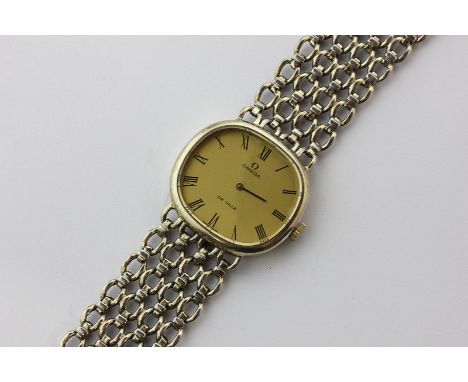 Omega, a lady's silver gilt bracelet watch de Ville model, manual wind movement