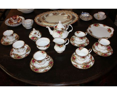 A Royal Albert Old Country Roses tea service for six, comprising teapot, milk jug, sugar bowl with cover, six teacups, saucer