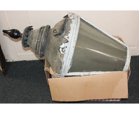A large metal lantern, conical form with domed top and finial (a/f) (NC)
