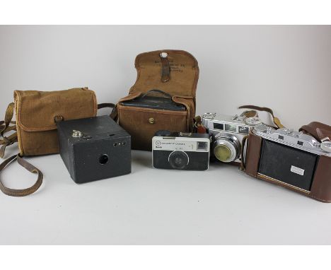 A No 2 Box Brownie camera together with four other cameras