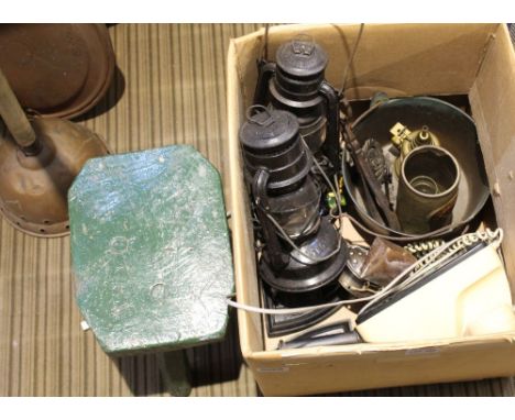A BOX CONTAINING A SELECTION OF DOMESTIC COLLECTABLES to include vintage telephone, Tilley lamps, green painted milking stool