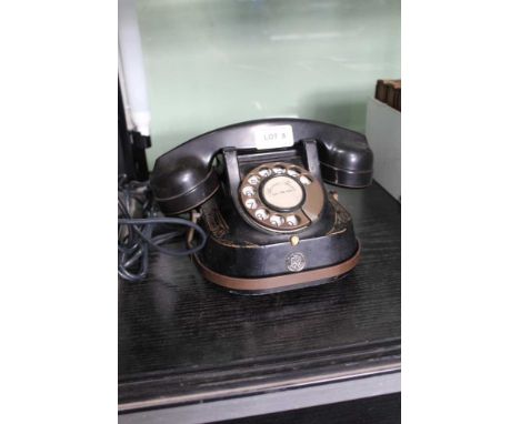 A VINTAGE METAL DIAL TELEPHONE by Bell Industries 