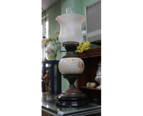 A METAL &amp; POTTERY BASED OIL LAMP 