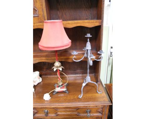 A DECORATIVE TABLE LAMP, together with a wrought metal five sconce table candelabra 