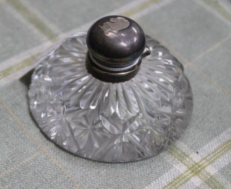 A SMALL HALLMARKED SILVER LIDDED INKWELL with cut glass base 