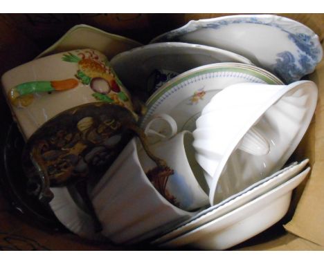 Two boxes containing a quantity of assorted ceramic items including old jelly mould, cheese dish, etc.