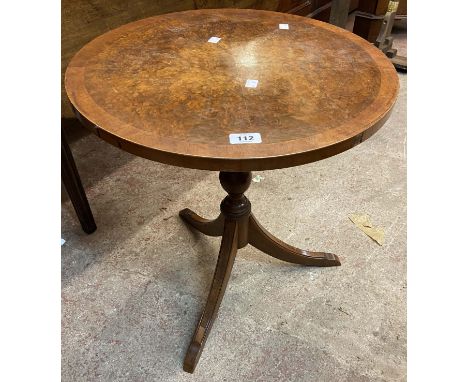 A 50cm diameter Bevan Funnell Reprodux pedestal table set on turned pillar and tripod base