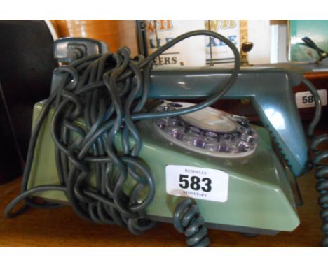 A vintage Trimphone in two tone green