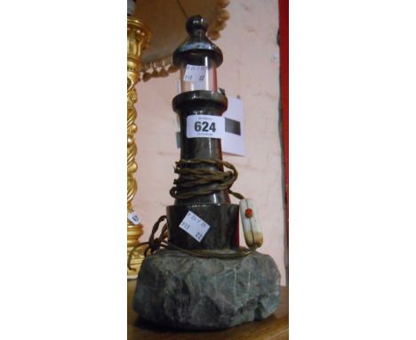 A vintage Cornish serpentine table lamp in the form of a lighthouse