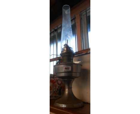 A chrome plated Aladdin oil lamp with chimney - shade missing