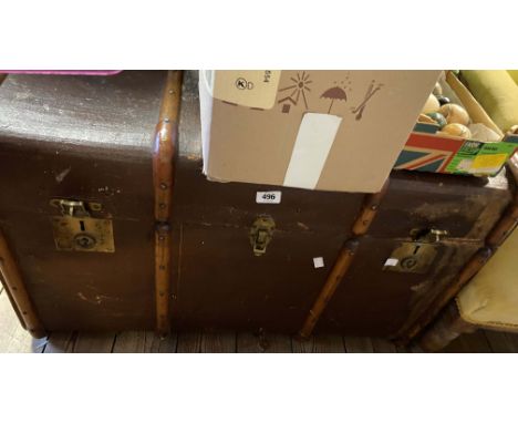 An old cane bound travelling trunk with weather coating and double tray fitted interior - sold with another