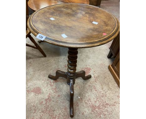 A 19th Century mahogany pedestal table, set on bobbin turned pillar and tripod base