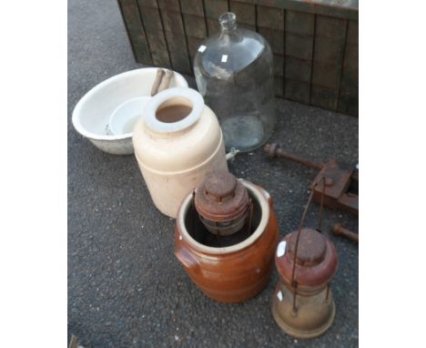 An old water dispenser - sold with a ceramic pot and two lanterns