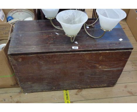 A 64cm old stained pine lift-top box containing a collection of assorted vintage tins and tea cannister, etc.