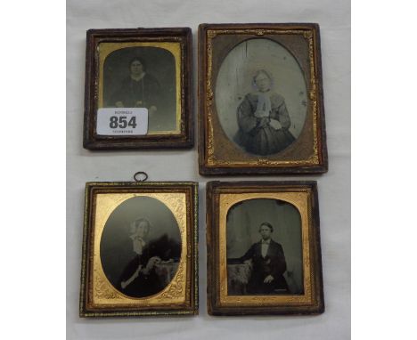 Four Victorian gilt mounted ambrotype photographs