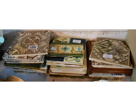A quantity of Victorian and later ceramic tiles including Art Nouveau examples, Mintons, etc. - various condition