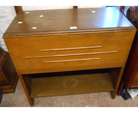 An 82.5cm vintage polished oak record cabinet with partitioned interior enclosed by a lift-top and open undertier