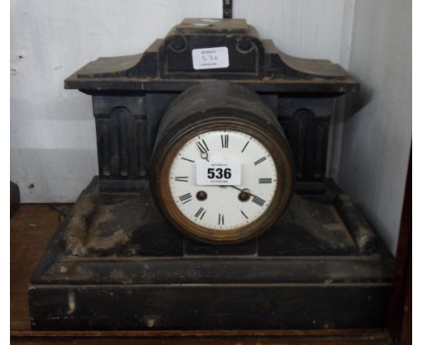 A late Victorian black slate cased drum and scroll mantle clock with eight day bell striking movement - sold with another bla