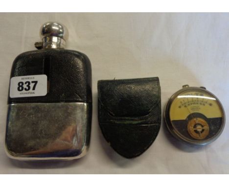 A vintage silver plated and leather clad hip flask - sold with a cased voltmeter